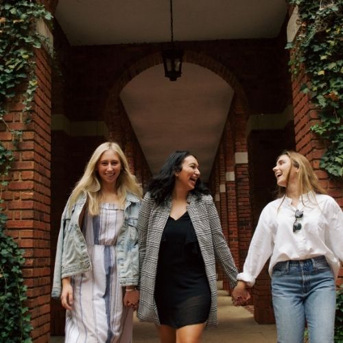 three girls walking